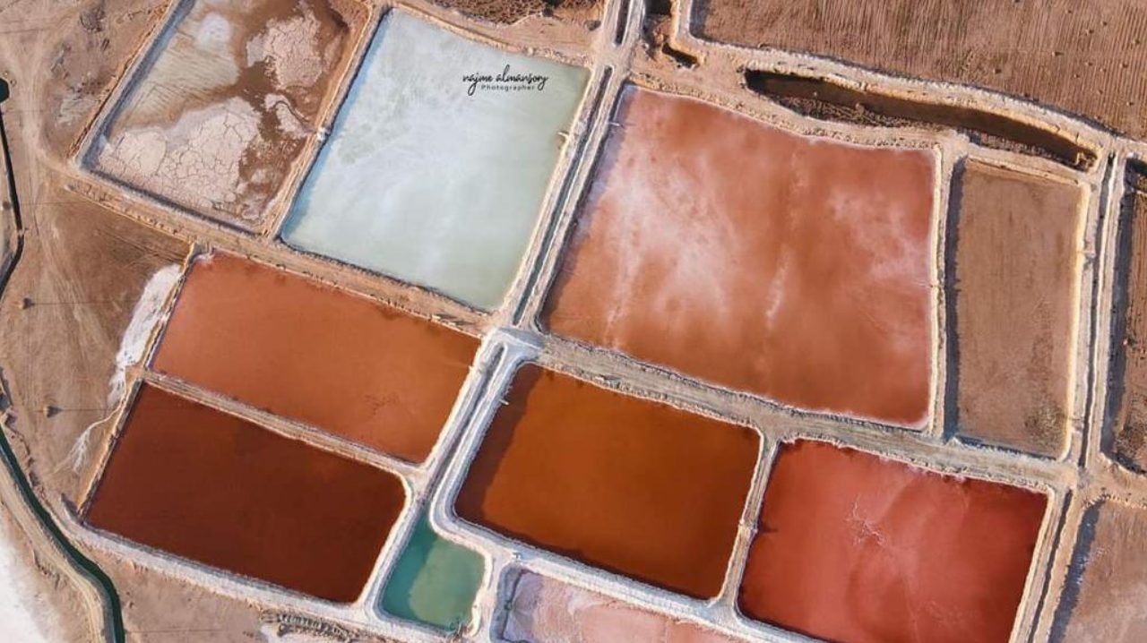 Oblique aerial view of Al Mozan concentrator ponds and levees at Ras Ajdir, Libya
